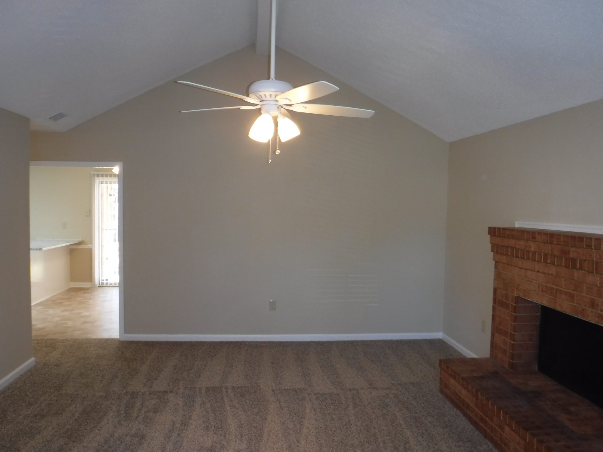 15 X 18 SEPARATE LIVING ROOM WITH HIGH CEILINGS AND NEW CEILING FAN